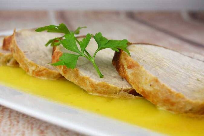 LOMO DE CERDO EN SALSA DE NARANJA