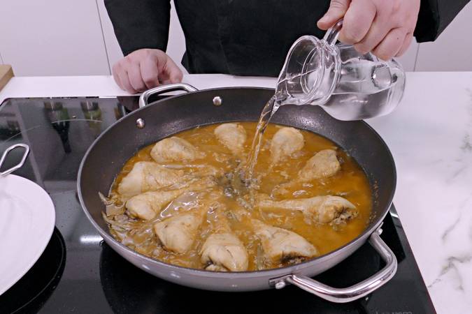  Paso 6 de Pollo entomatado receta tradicional